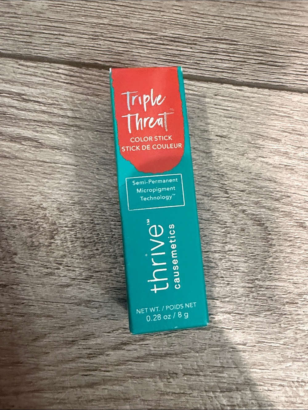 Thrive Causemetics Triple Threat Color Stick in Kandee a true red matte